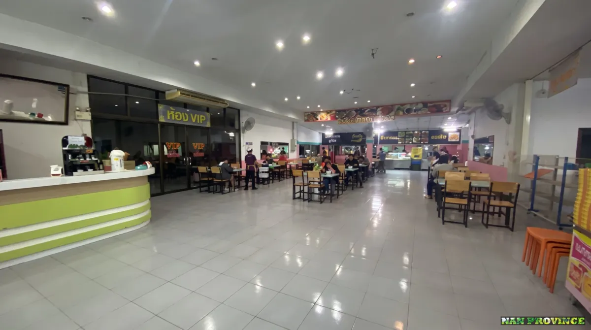 The midnight buffet rest stop—a classic ritual during long-distance overnight bus rides across Thailand.