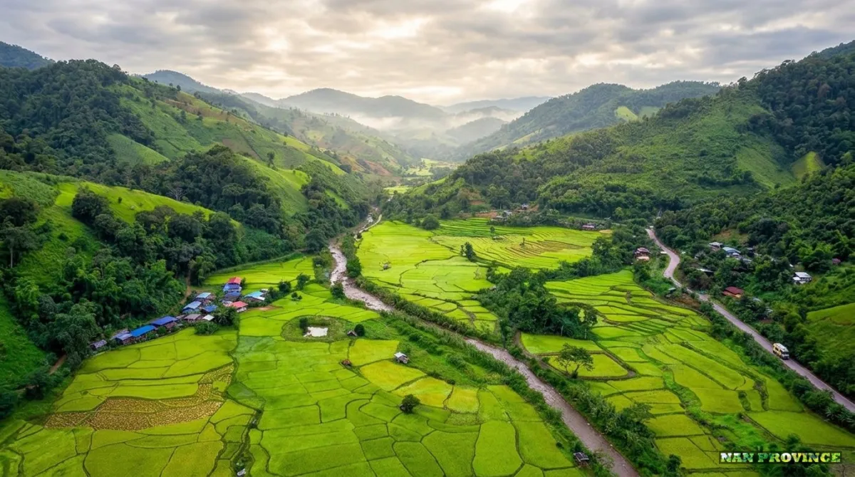 The scenic, winding rural roads through the green valleys of Pua in Nan